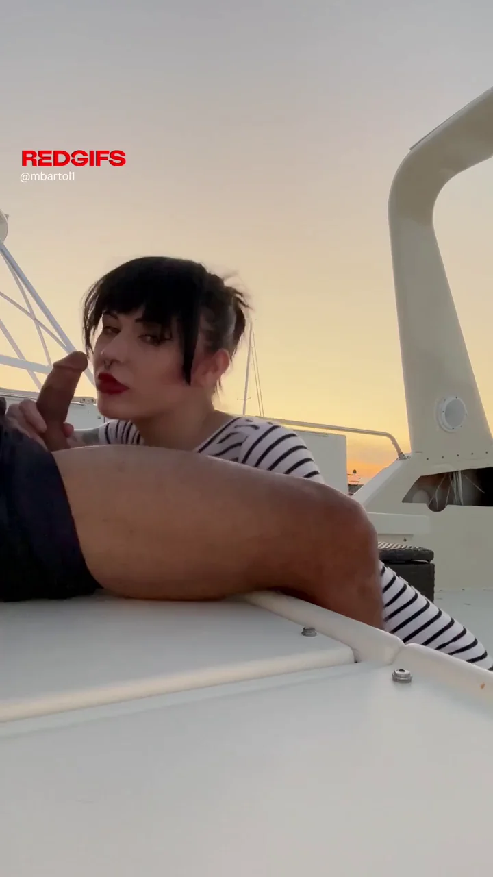 Boat Slut Deepthroats Massive Cock Next to Packed Dockside Bar