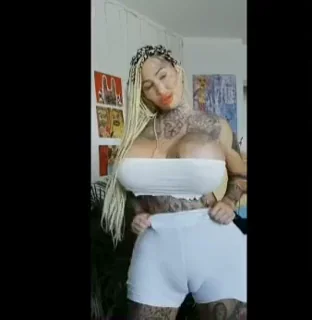 Inked Bombshell's Snapchat Tit Tease: Massive Tats & Mega Mams