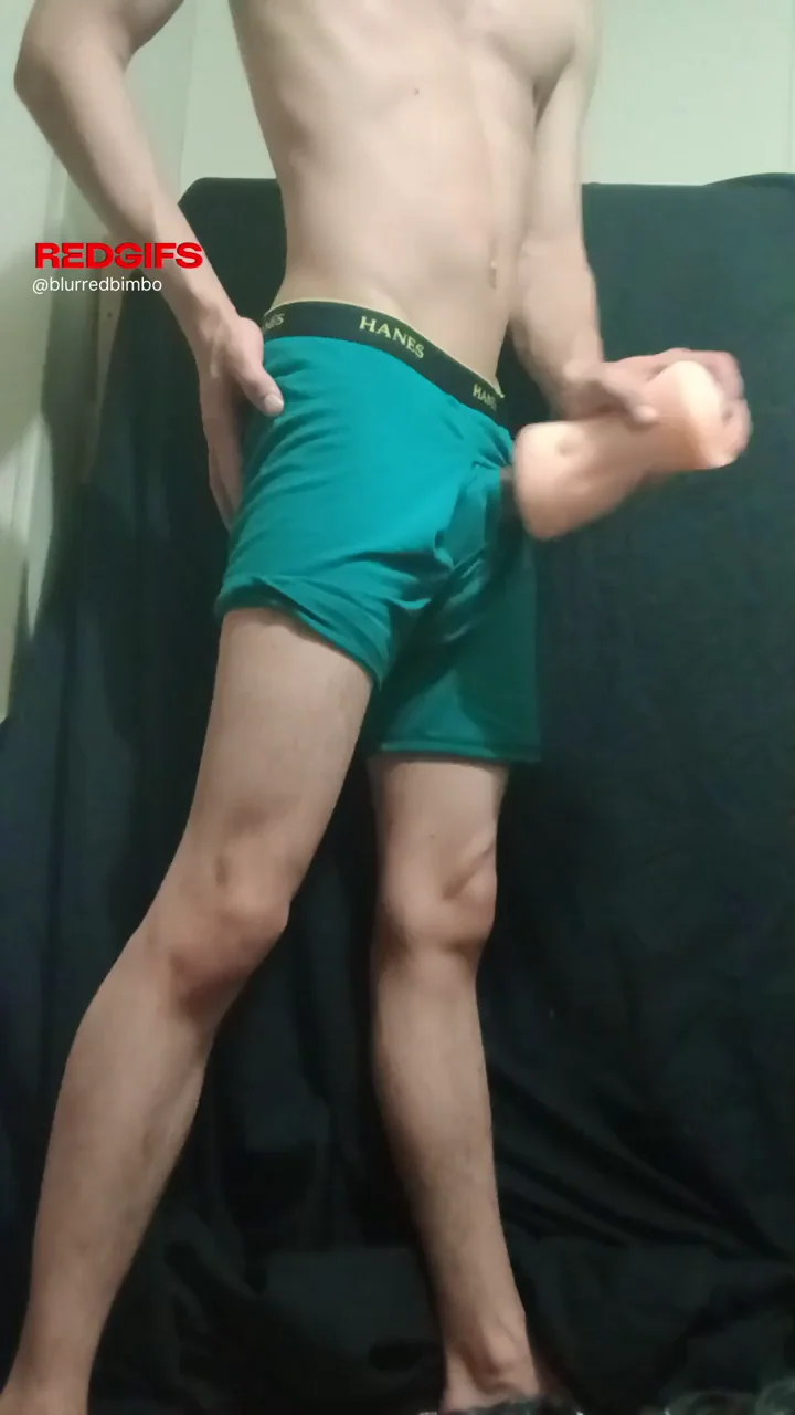 Dominant Twink Flexes Abs and Teases Huge Cock in Tight Boxers