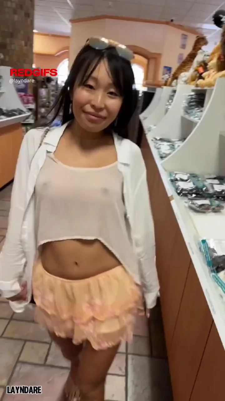 When you thought her tits were mostly visible thru her top she bends over and shows her bare pussy (f)! Now that's a perfect dare!