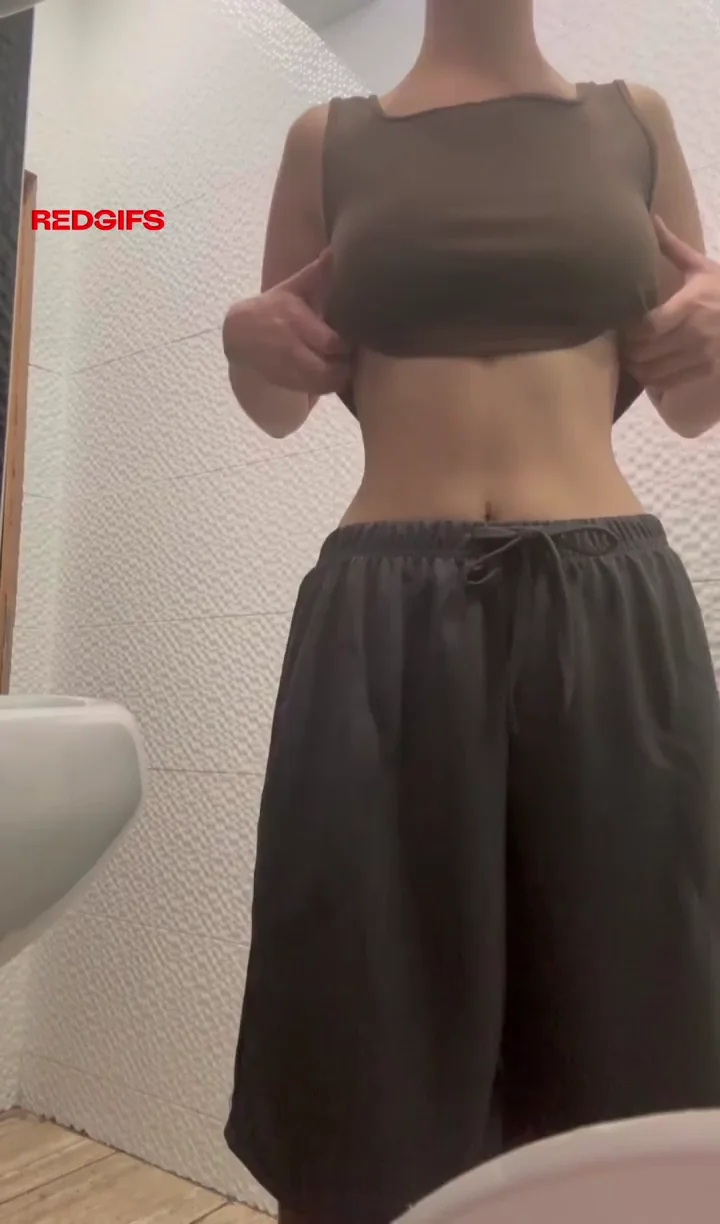 Tomboy Tease Flashes Perky Tits & Fingers Herself in Gym Bathroom