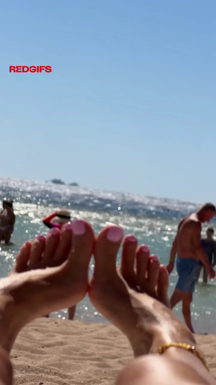 Beach Slut's Red-Painted Toes Beg for Worship - RedSIFs Foot Tease