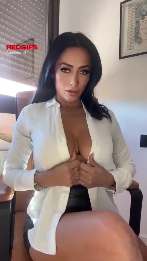 Naughty Latina MILF Teases with Her Juicy Cleavage and Thick Thighs