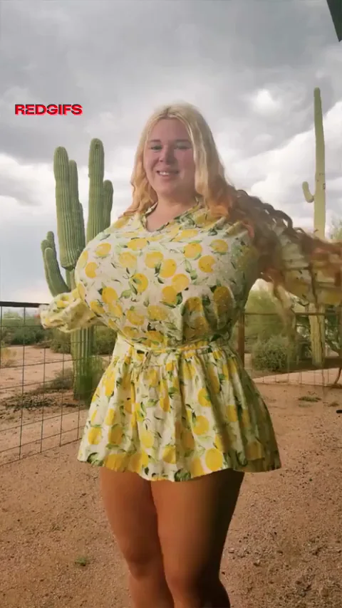 🌺 Busty Blonde Teases in Yellow Sundress 💛🍈🍈