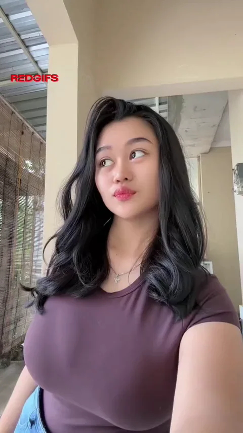 Maroon Top Meltdown: Busty Asian Babe's Tits Overflow