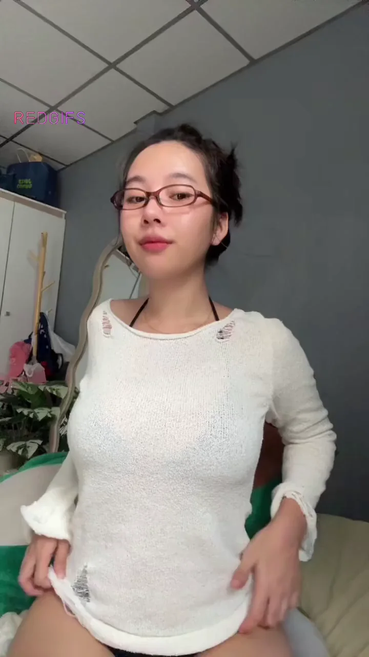 Curvy Asian Glasses Girl Teases with Massive Tits Flash - Your Move?