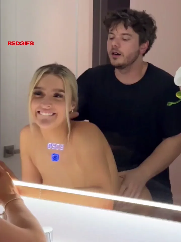 A sexy blonde was getting ready when a guy came up and fucked her in the bathroom.