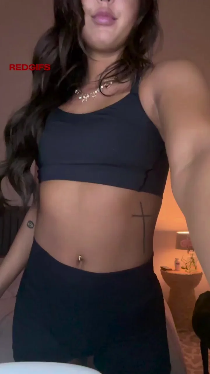 Nervous Petite Brunette Teases Her Perky Tits and Tight Ass in Black Sports Bra