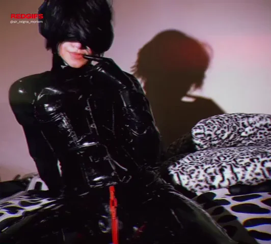 Wearing my latex suit with the red zipper
