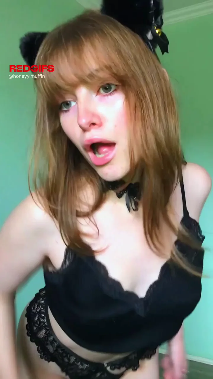 Playful Kitty Tease: Frisky Redhead Catgirl Flashes Her Perky Tits