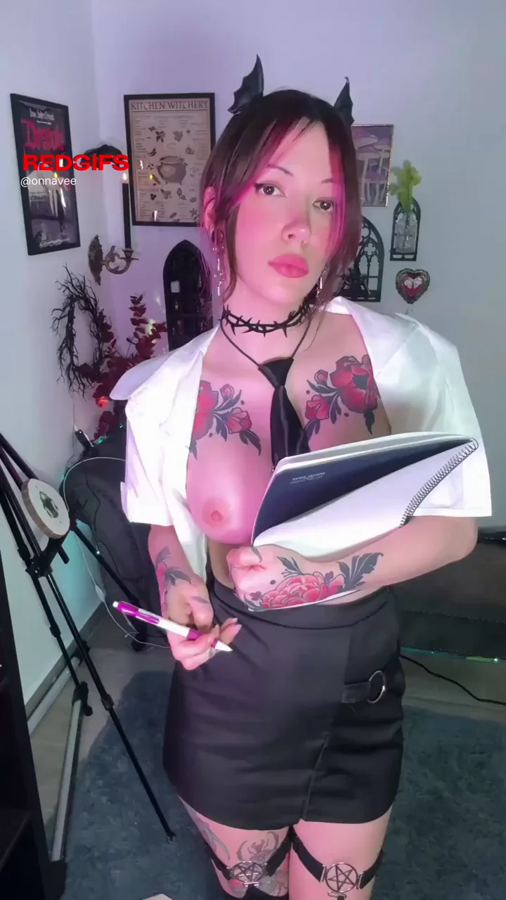 Petite Emo Secretary Slut with Demon Horns Teases Her Tatted Tits
