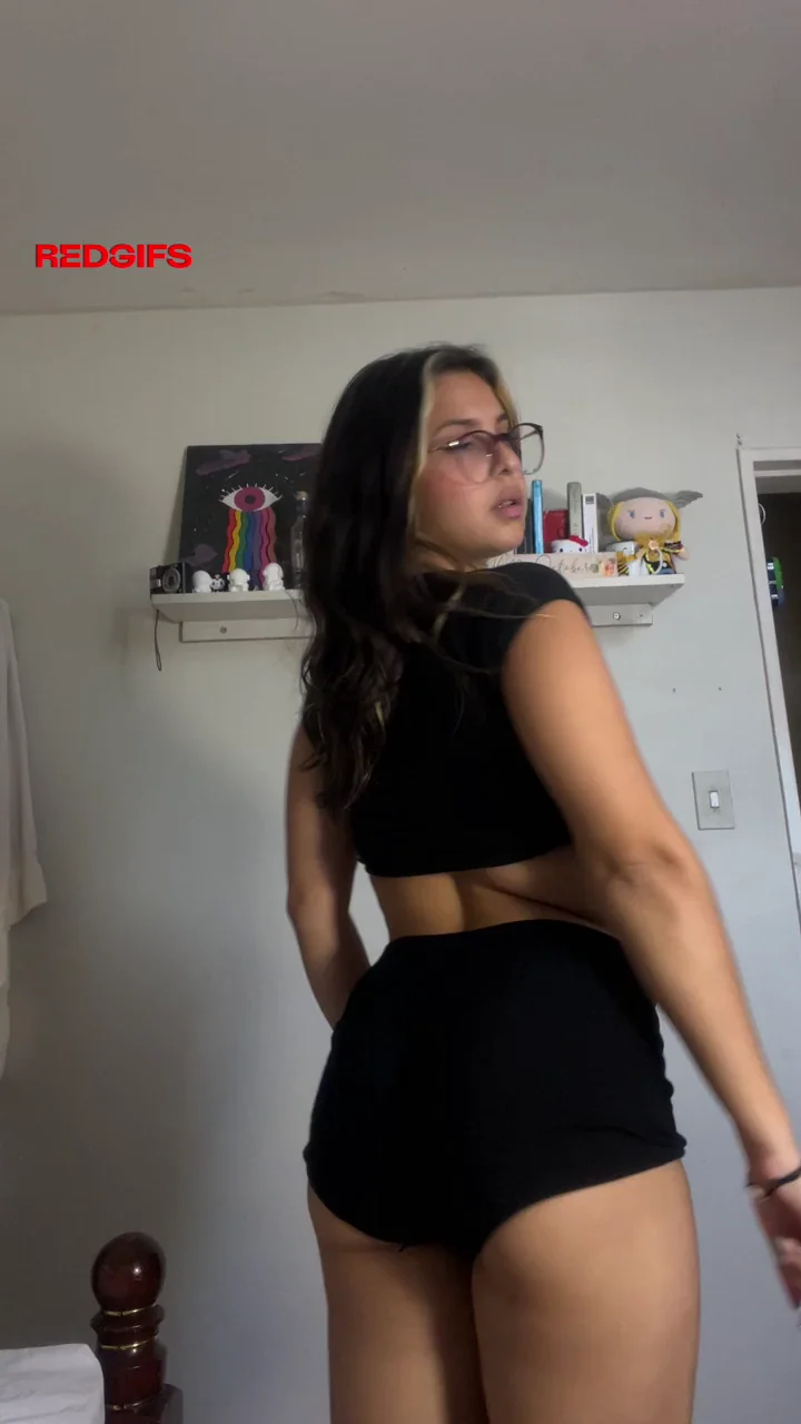 Touch My Slutty Curves: Glasses Babe Teases in Tight Black Shorts