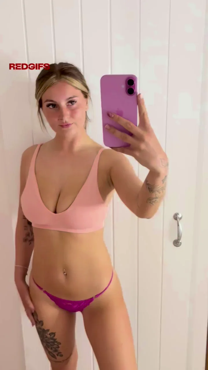 Blonde Bikini Bombshell Teases Her Perky Tits in New Pink String Set