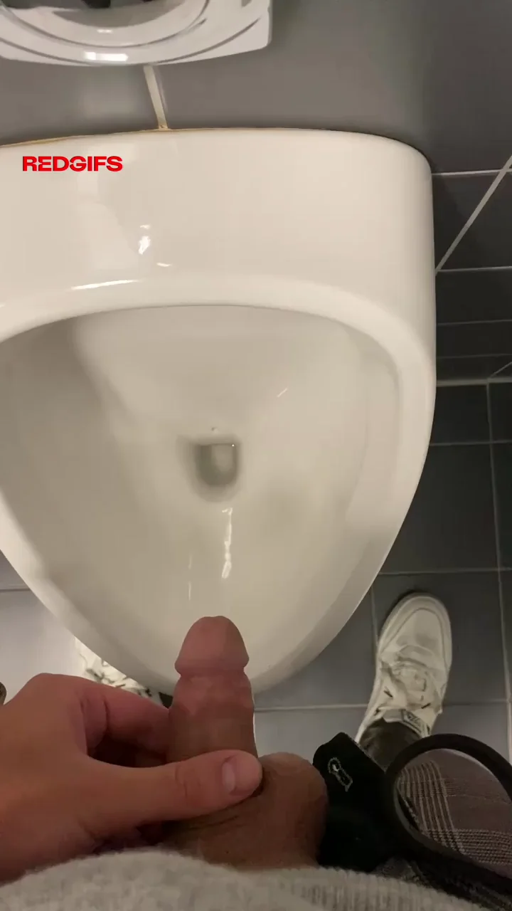 Strong switch exploring my peeing kink - piss at the corporate headquarter urinal