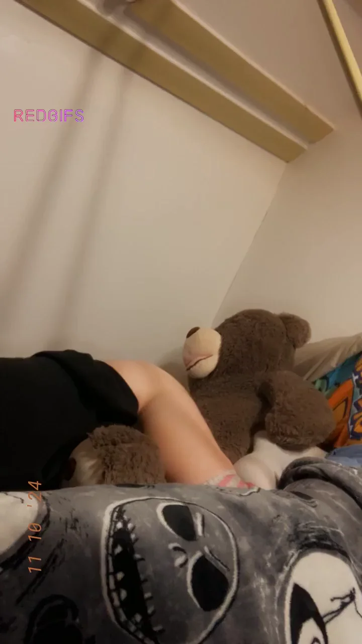Just a little girl and her teddy bear