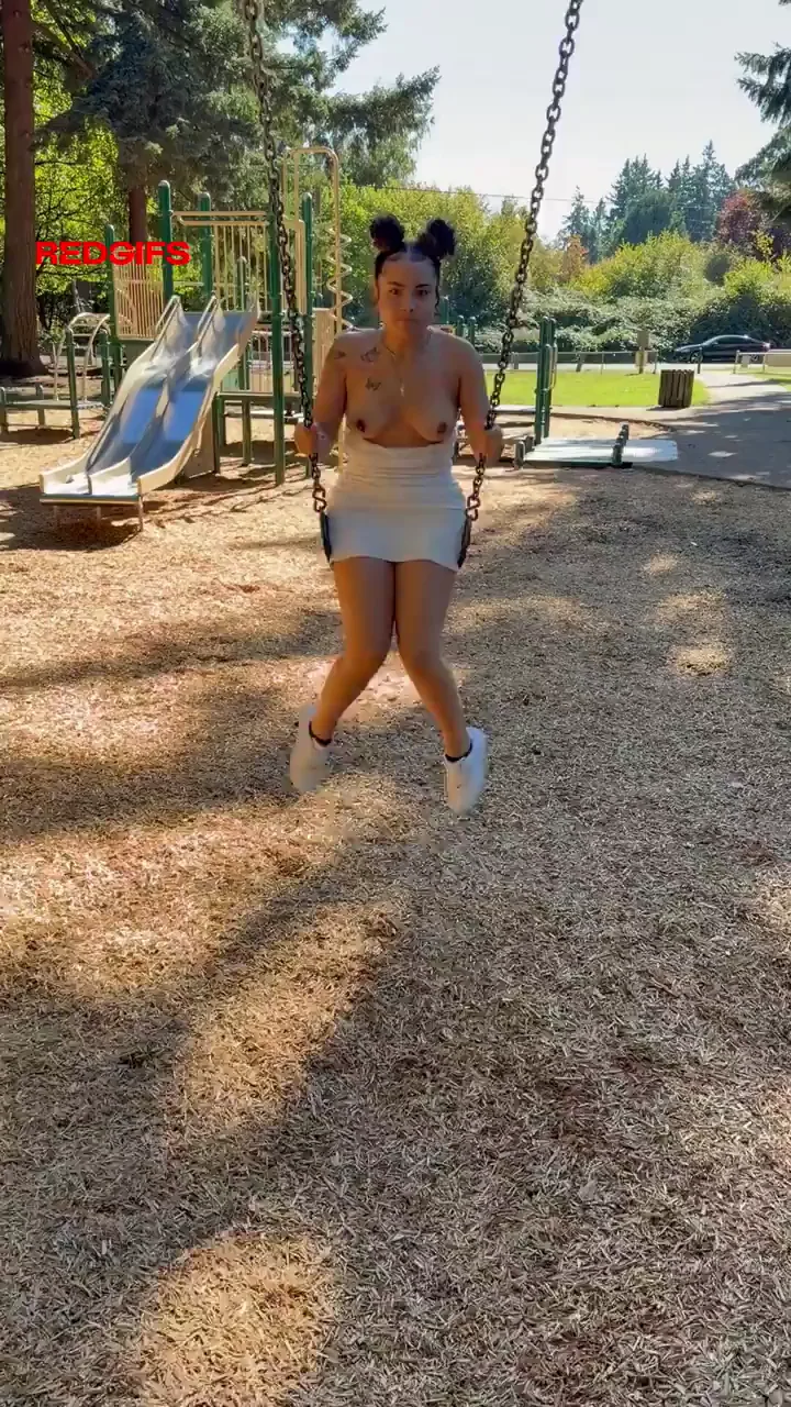 Tiny Latina Teen Flashes Pearl Panties on Park Swing
