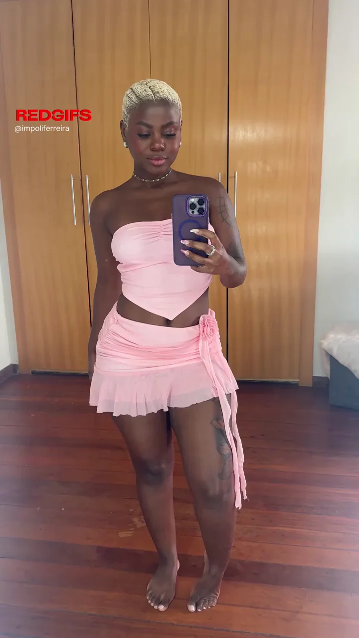 Shy Ebony Babe's Teasing Pink Skirt Pussy Peek