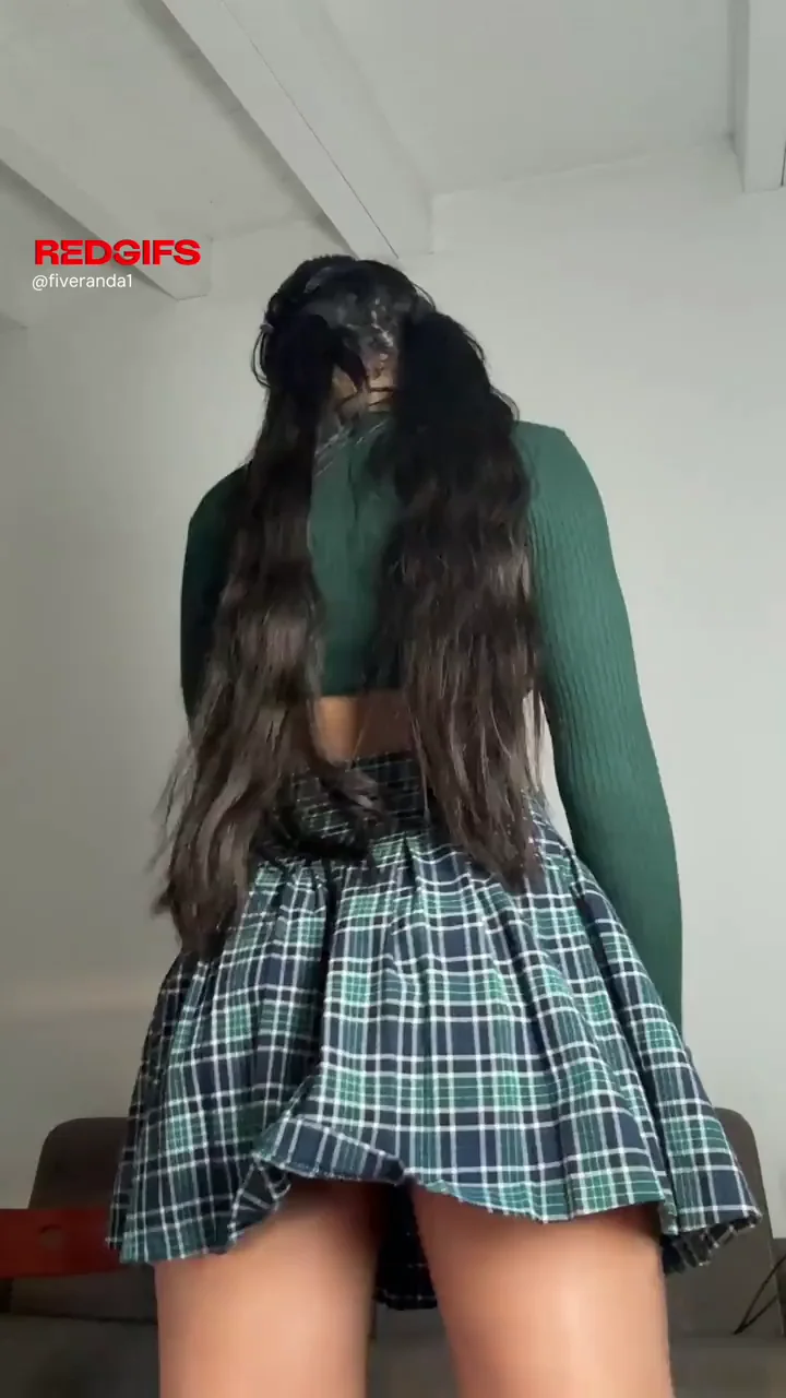 Appetizing black ass under a skirt