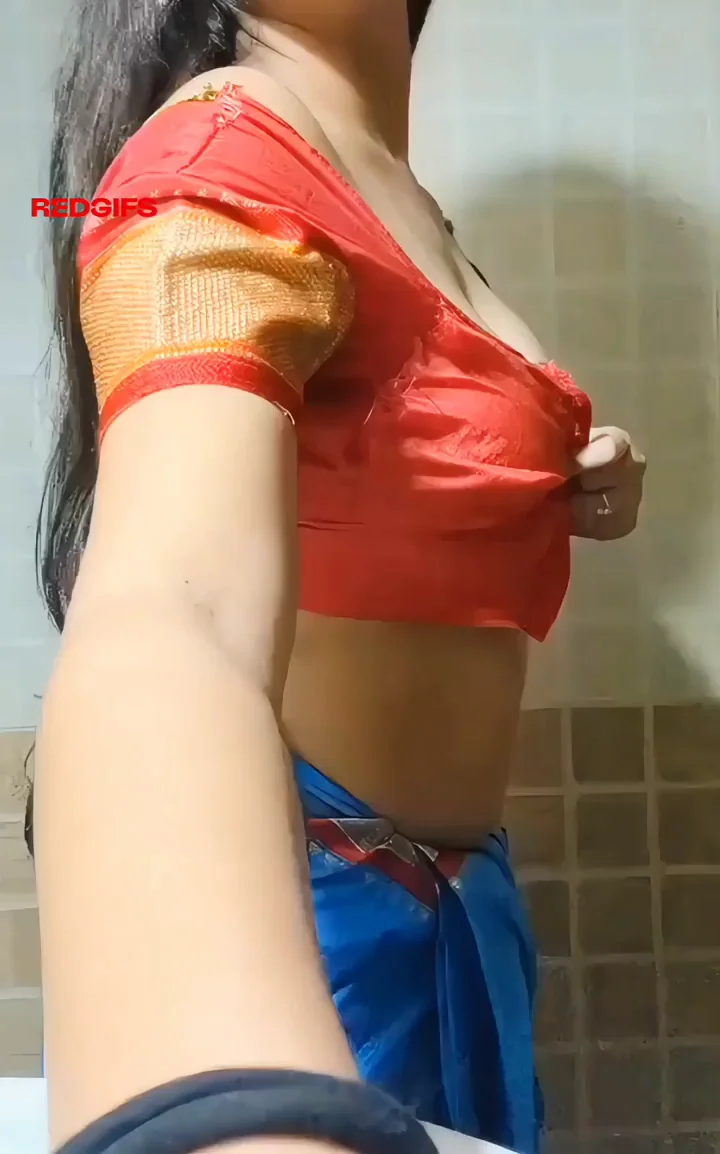 Hidden Cam Catches Desi Stepsis' Massive Tits Spill Out in Saree Tease 💦