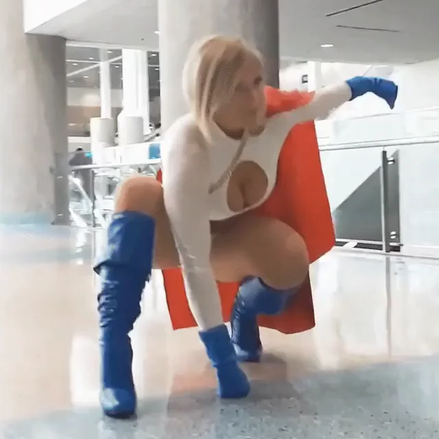 Power Girl Cosplay Tease in Thigh-High Boots
