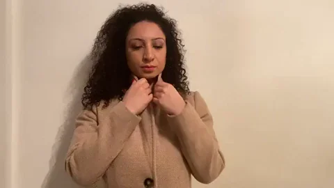 Curly Haired Hottie Teases Coat Open: Bigger Than You Thought Surprise! 🔥👅