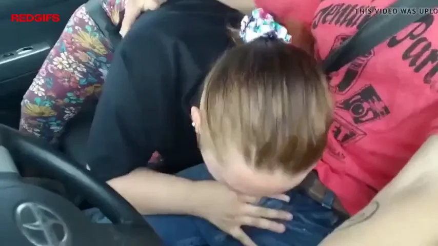 Guy receiving road head from lady friend