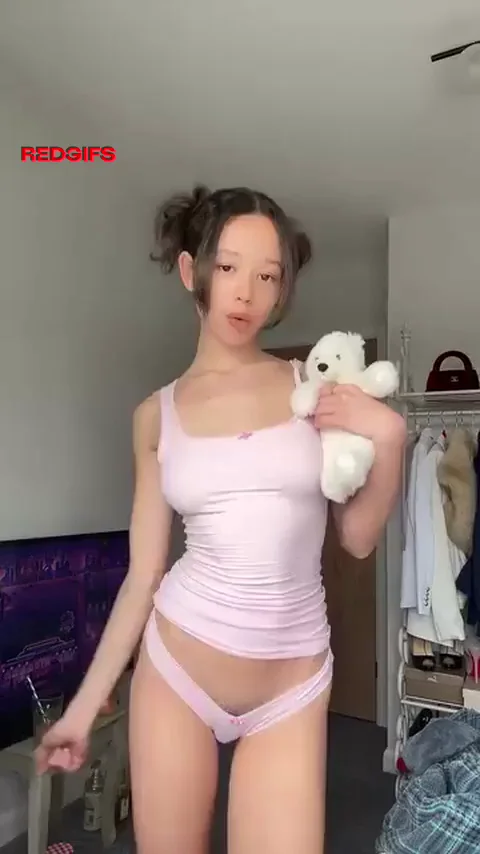 Bend Over Tease: Spank This Asian Cutie's Juicy Ass? 🍑🔥