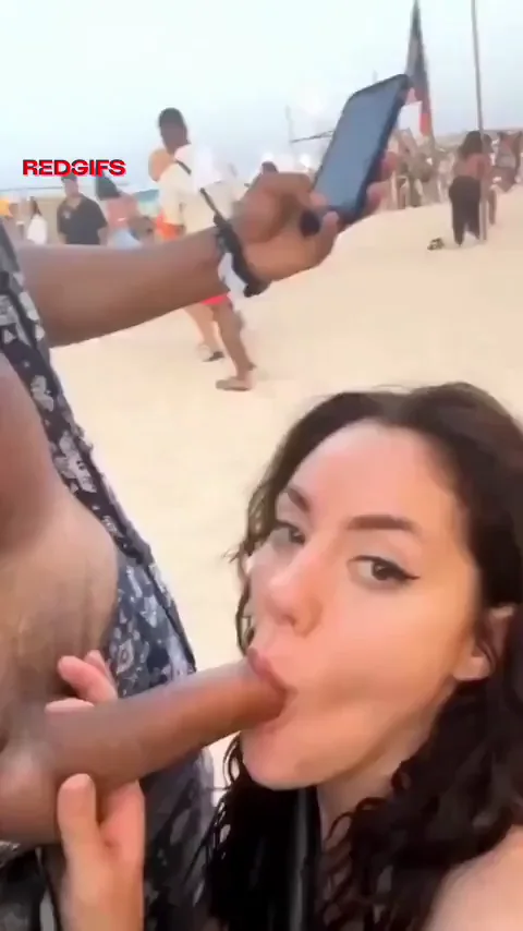 Giving a stranger a blowjob at the beach