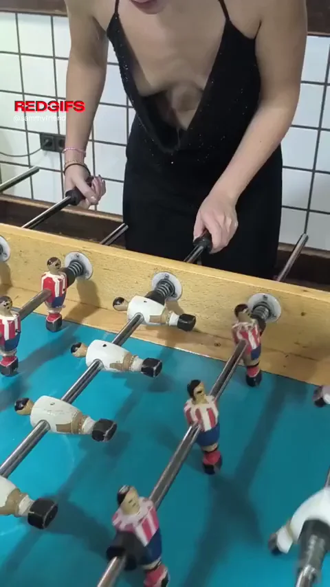 Oopsie Wardrobe Malfunction! 😏 Tiny Tits Nearly Pop Out Playing Foosball in Public 🔥