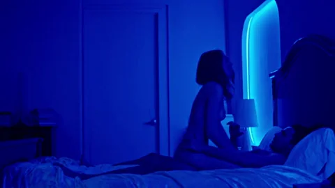 Tuppence Middleton and Christopher Abbott in Possessor (2020)