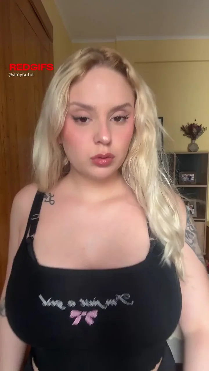 Blonde Latina Babe Strips Off Her Tight Bra and Teases Huge Tits