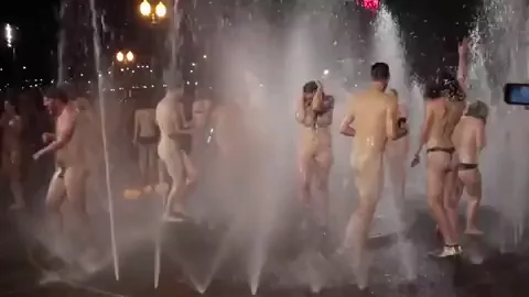 Naked Crew Splashing Wild in Steamy Outdoor Fountain Orgy