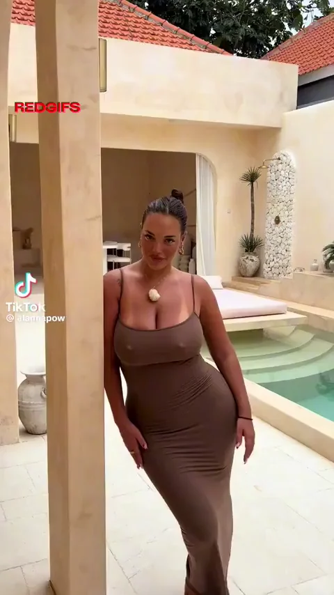 Them milkers were so astonishing that she bumped into the wall