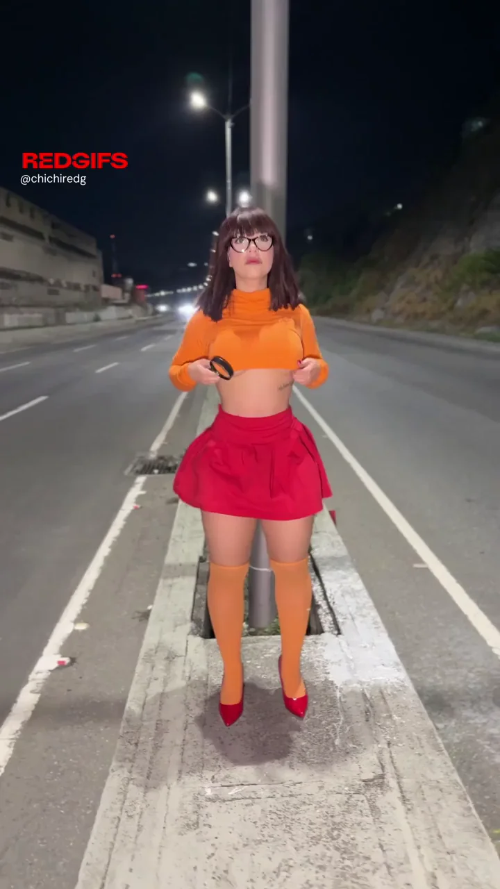 A latina girl minding her own business at the street