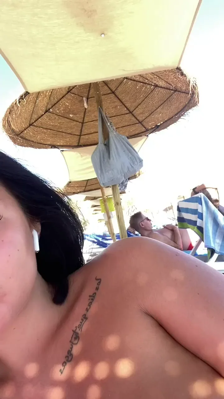 Beach Slut's Epic Tit Tease Under the Umbrella