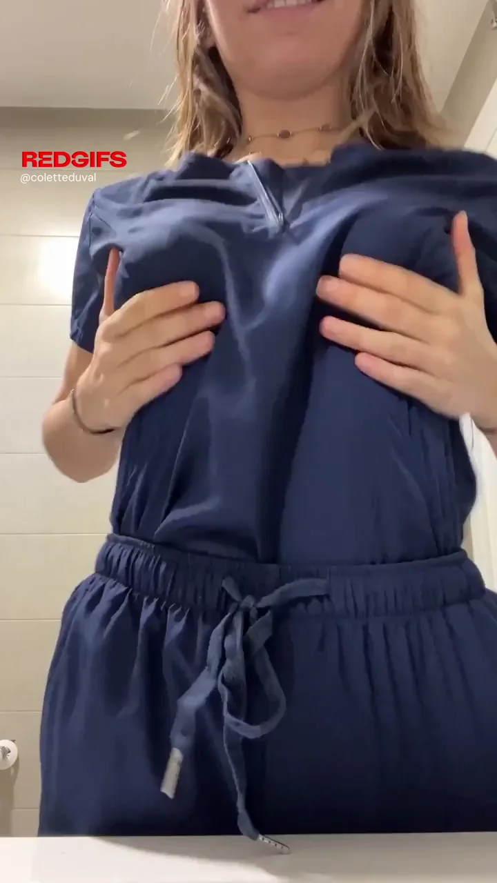 Naughty Nurse Bouncing Her Big Tits in Scrubs at Work