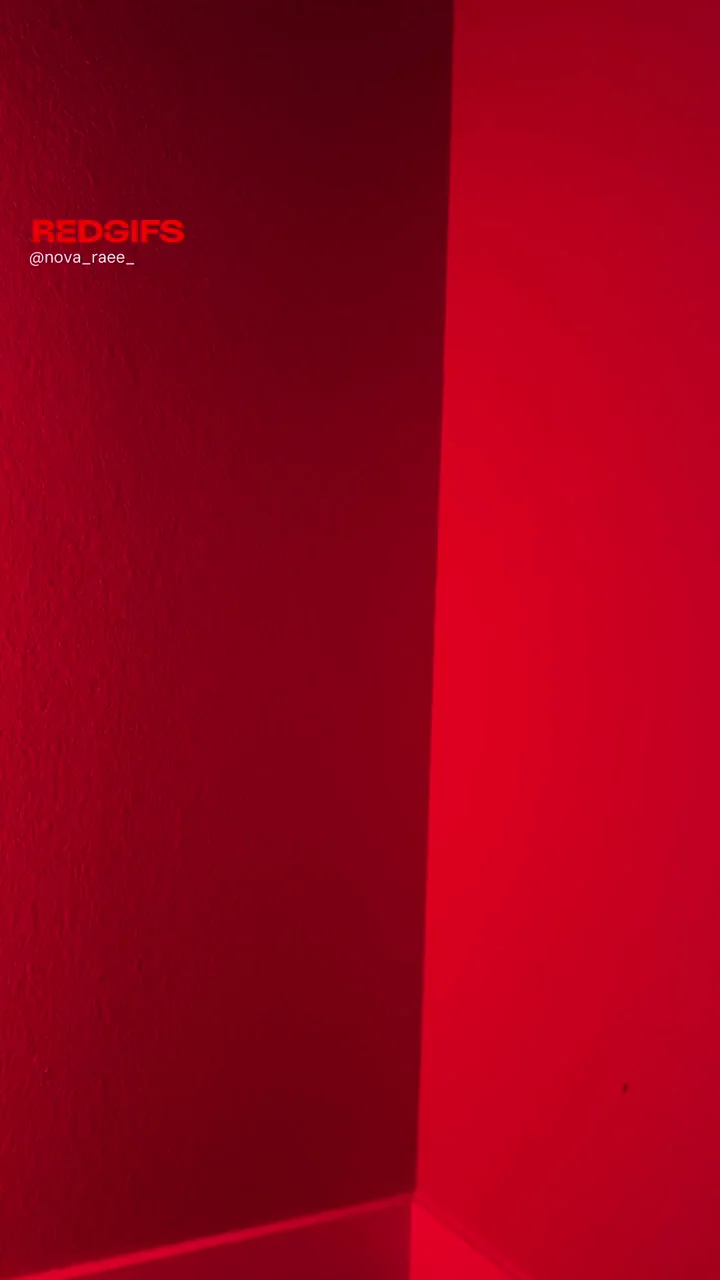 Nova Rae's Juicy Ass Tease in Red Glow