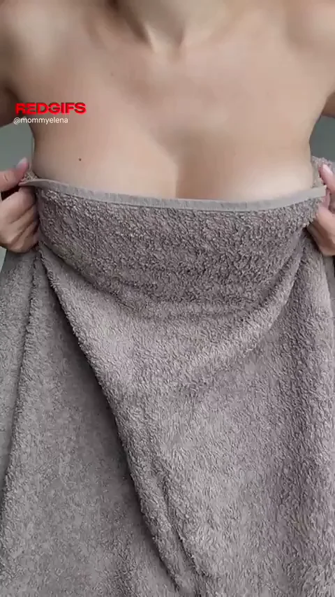 MILF Spice Tease: Towel Slip Reveals Massive Natural Jugs