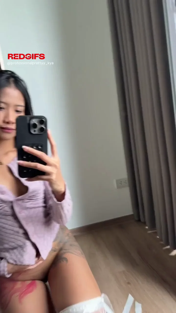 Petite Tease in Purple: Guilty-Looking Selfie Slut Drops the Top