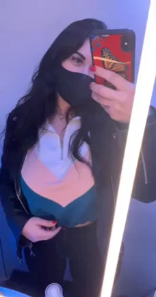 Tempting Tease: Masked Amateur Flashes Massive Tits in Steamy Mirror Strip