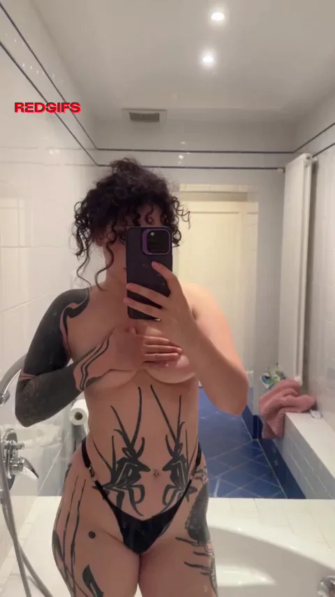Goth girl with a stunning figure