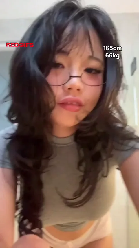 Cute Asian Thot's Cuddly Tease in Tight Tee