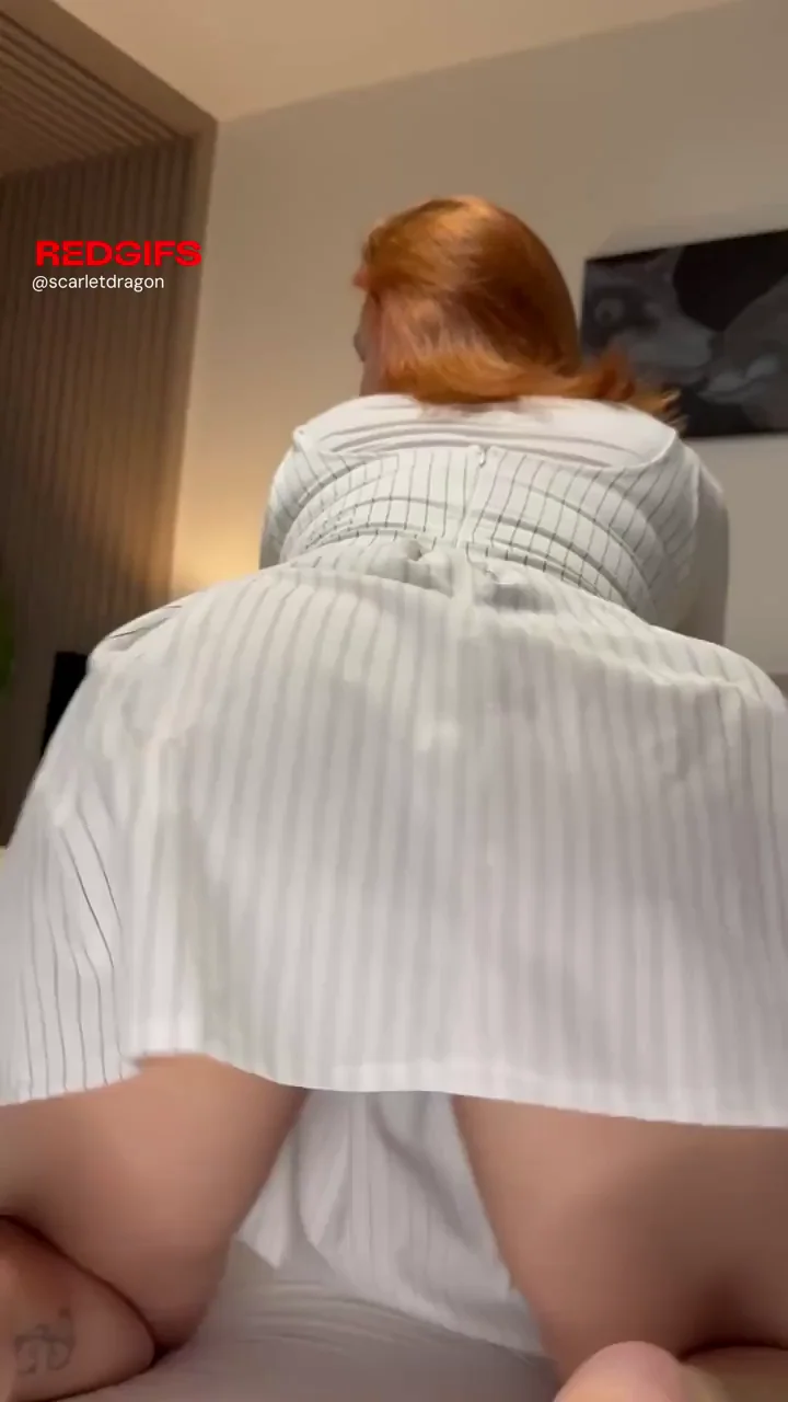 Redhead MILF Bends Over in Striped Dress, Begging You to Rip Panties Aside with Teeth