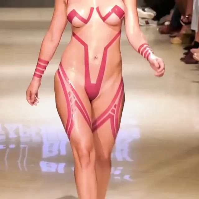 Tape-Slut Struts Her Slutty Body on Runway