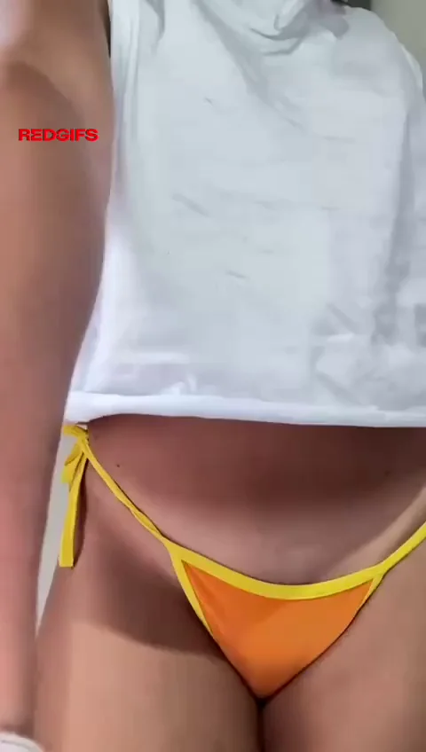 Petite Asian Tease Unveils Her Tiny Perky Tits in Slutty String Bikini