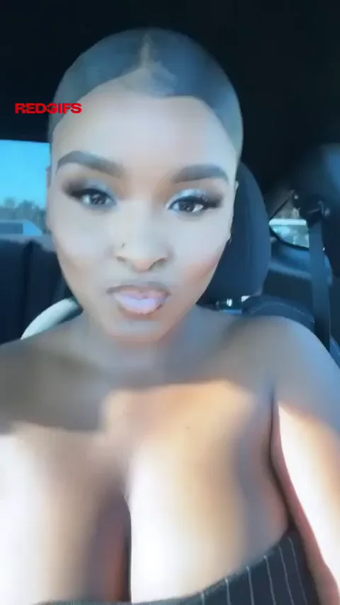 Thick Ebony Babe Flashes Massive Tits in Car Tease