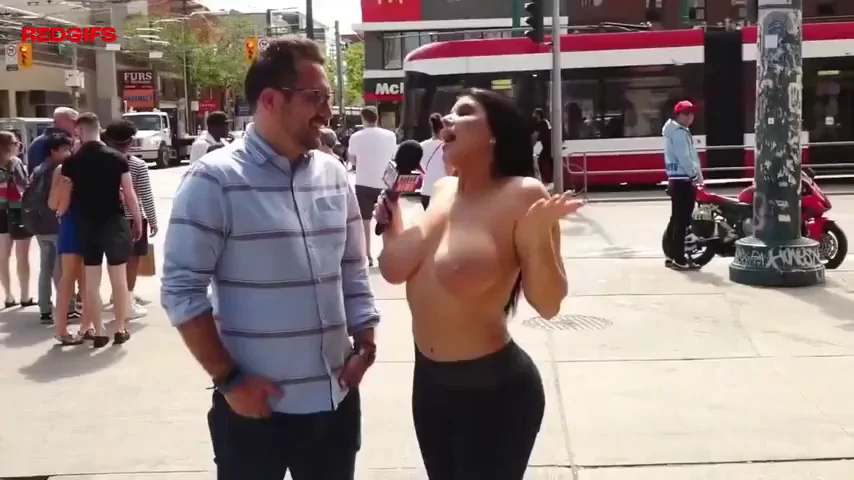 Romi Rain interviewing people on the streets of Toronto