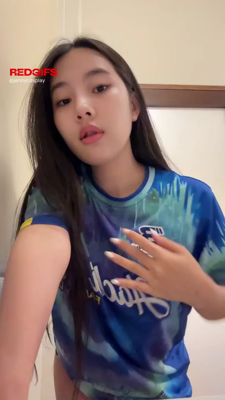 Asian Busty Babe Teases Her Massive Tits in Tight Jersey