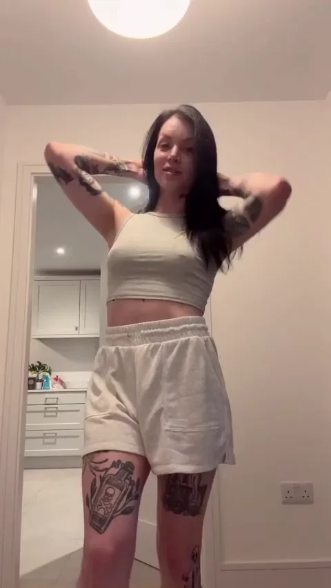Peek under mommy’s shorts… hiding something huge