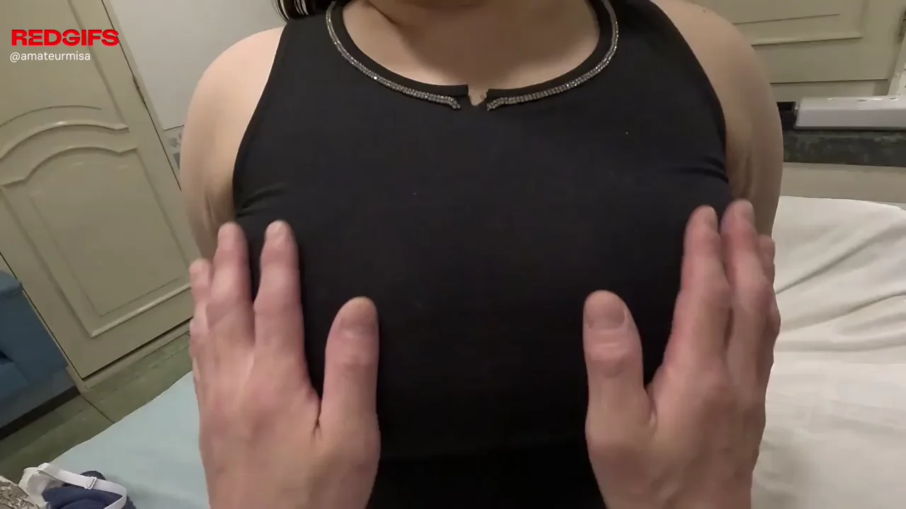 Ripping a shirt to unveil the big boobs of a Japanese amateur